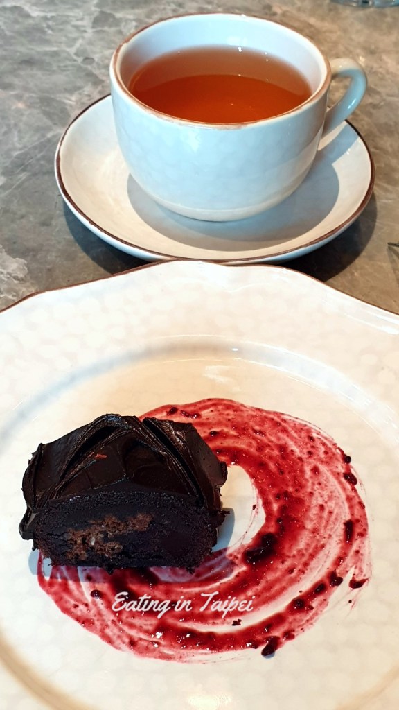 The chocolate-log-type-thing was OK, but nothing special. A slice of a log served up with a berry smear.